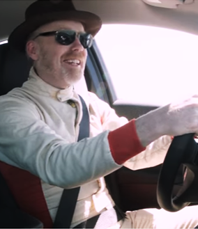 Adam Savage sitting in a car 